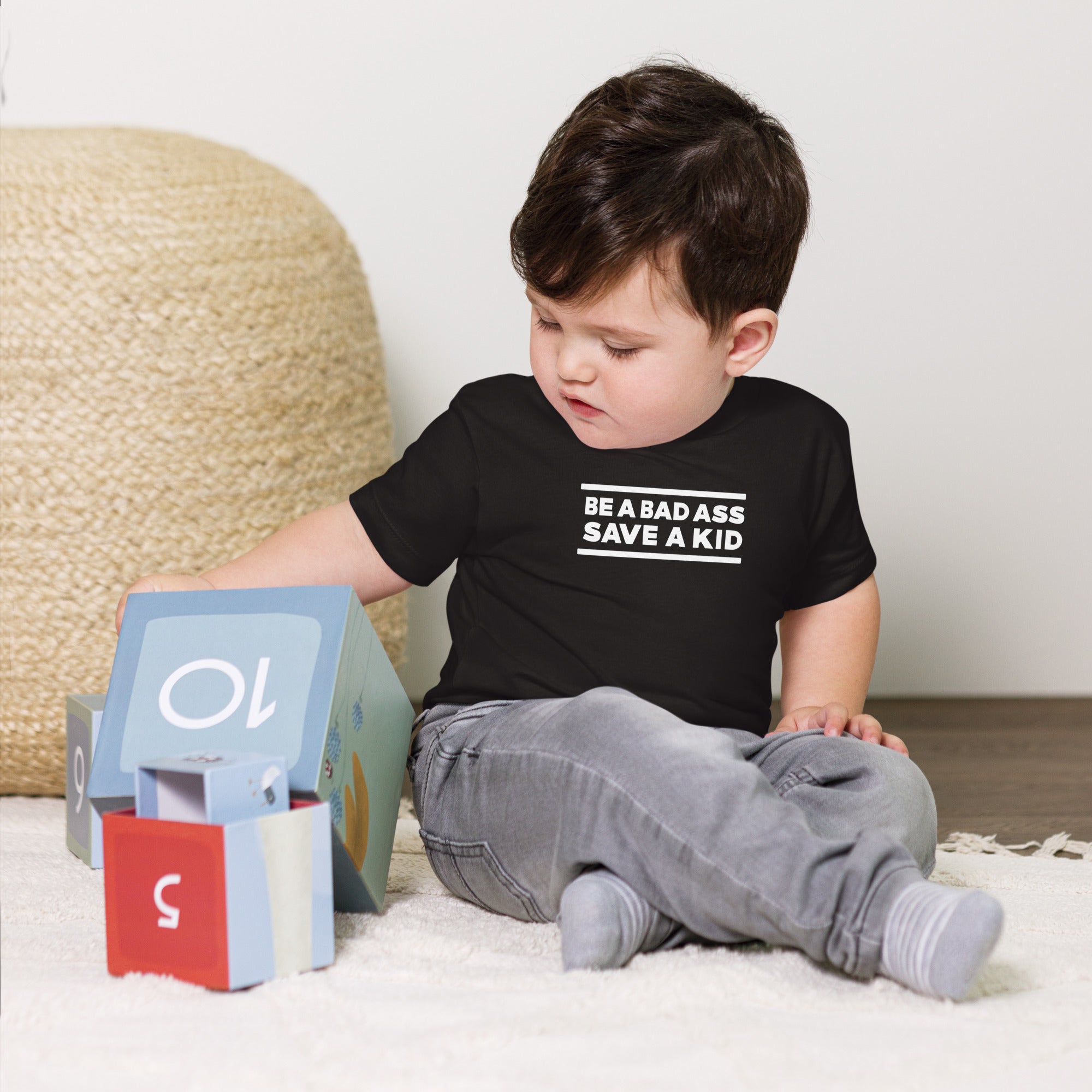 Be A Badass Save A Kid Baby Jersey Short Sleeve Tee